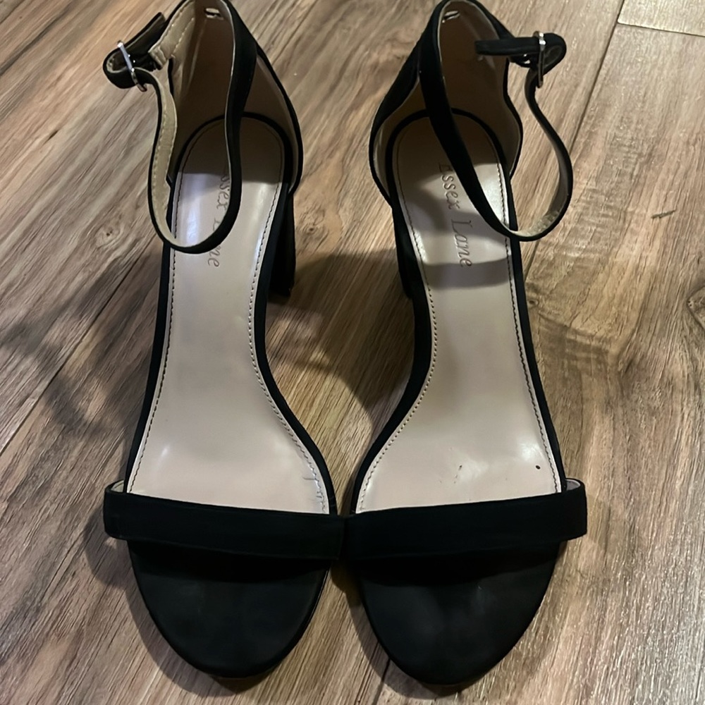 Black suede chunky heels in size 8 like new. Strap around heel. Like new